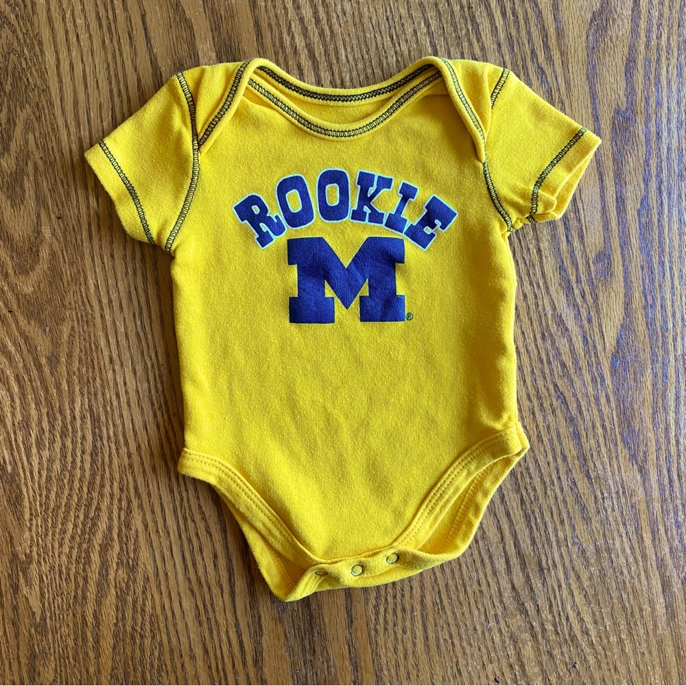 U of M Yellow Baby One-Piece Bodysuit
